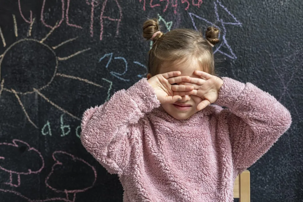 An image of a portrait little girl upset